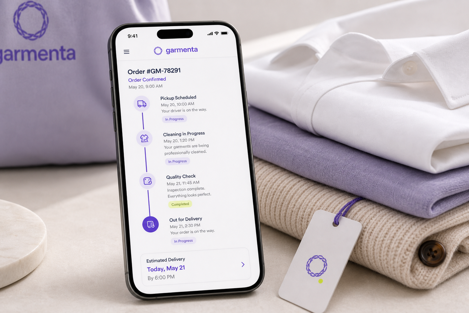 Smartphone showing a clean Garmenta order timeline